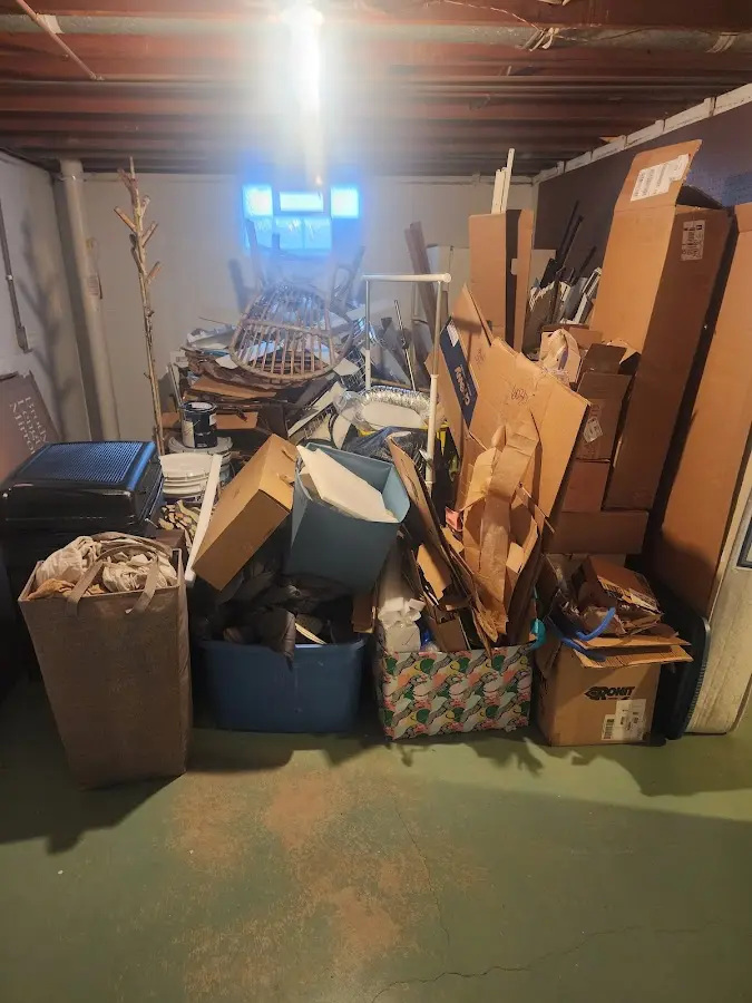 Roll-off dumpster container at job site for 2 Yard Dumpster Rental in Hilton Head Island